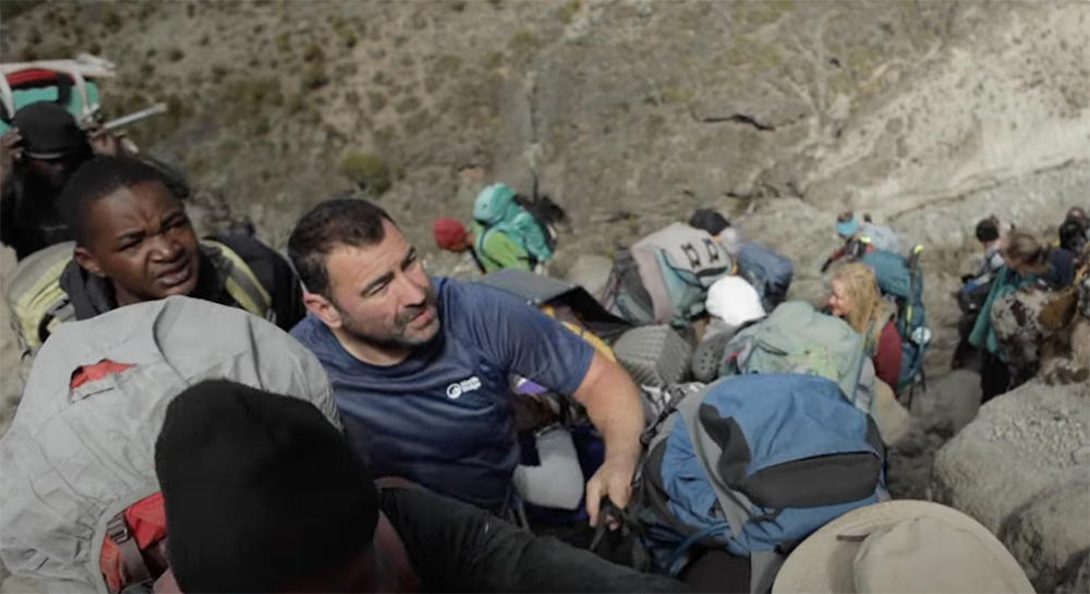 Andy Reid Becomes First Triple Amputee to Summit Mt. Kilimanjaro